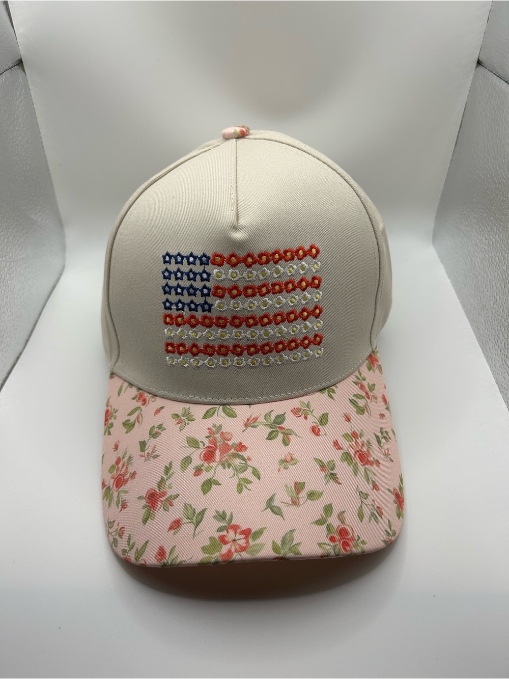 Women’s Floral Pink and Cream Baseball Cap with Flag Accent